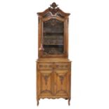 A French carved oak bookcase on cupboard,