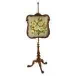 A Gillows of Lancaster walnut fire screen,