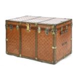 A large leather and studded travelling trunk,