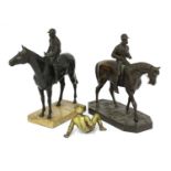 An equestrian bronze group,