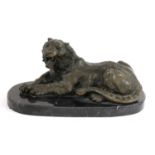 A French bronze sculpture of a recumbent tiger,