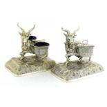 A pair of silver-plated cruets in the form of goats,