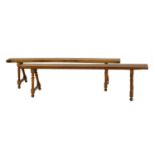 A pair of French cherrywood narrow benches,