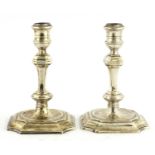 A pair of George I Britannia standard silver candlesticks,
