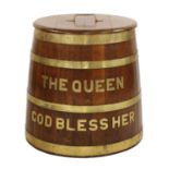 A large coopered oak and brass Navy rum barrel log bin,