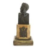 A bronze bust,
