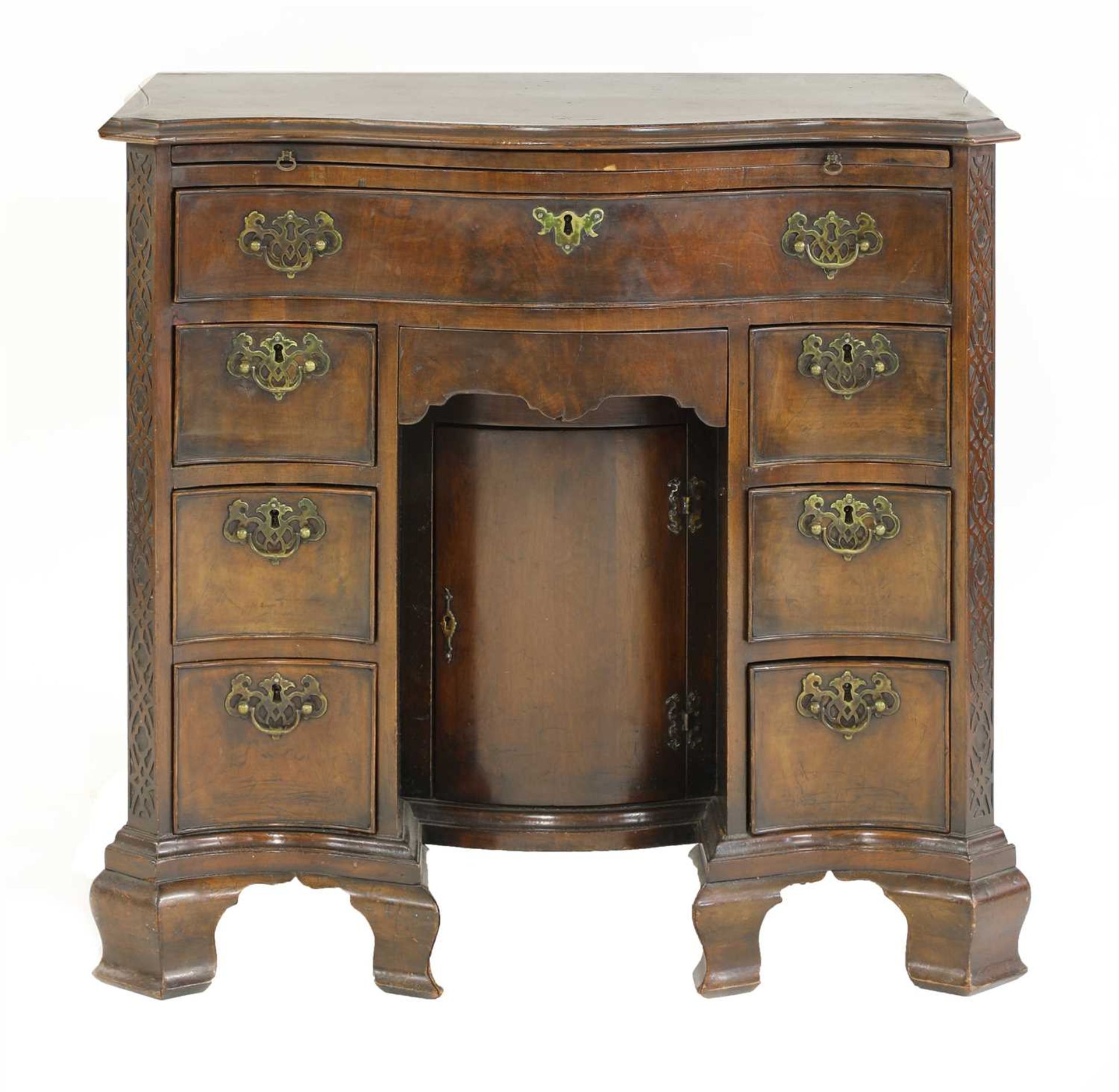A George III-style mahogany kneehole desk,