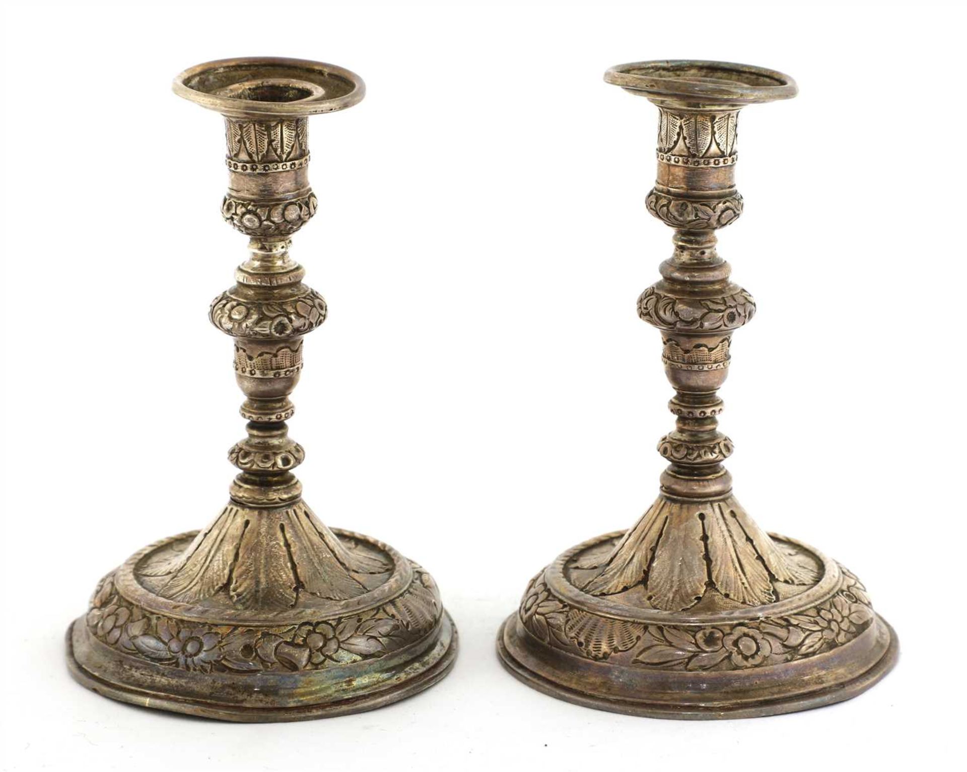 A pair of silver tapersticks,