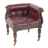 A William IV mahogany and buttoned leather upholstered corner chair,