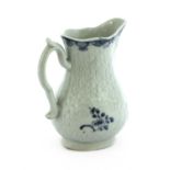 A William Reid porcelain cream jug,