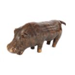 A leather hippopotamus footstool,
