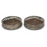 A pair of George III wine coasters,