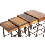 A nest of four Regency specimenwood and ebonised quartetto tables,