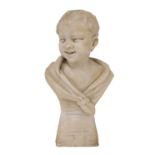 A carved alabaster figure of a boy,