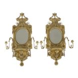 A pair of Adam-style four-light girandole wall mirrors,