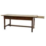 An walnut refectory table,