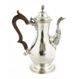 A George III silver coffee pot,