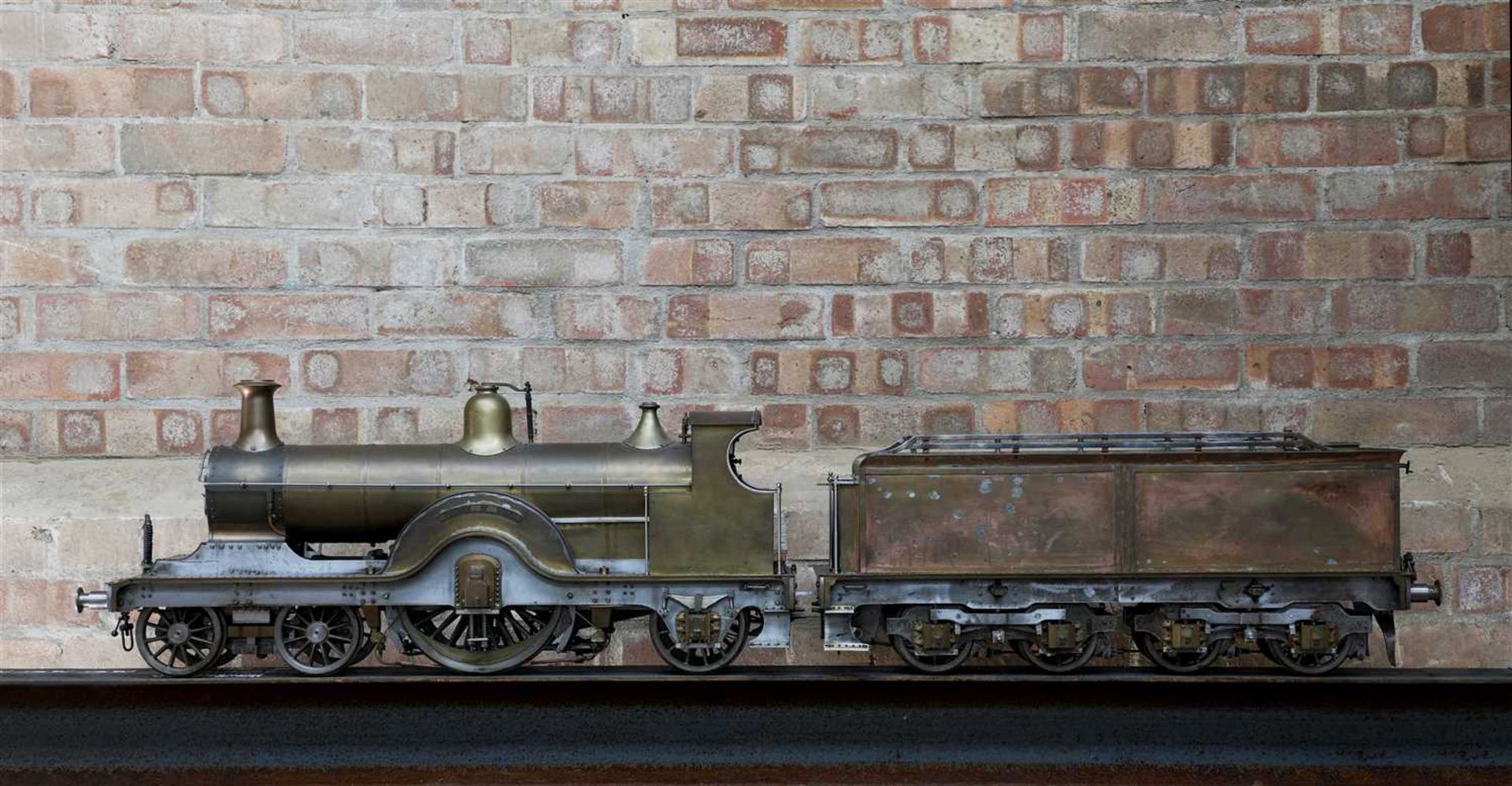 A 5in gauge live steam model of the Midland Railway 115 Class 4-2-2 Johnson 'Spinner' locomotive,