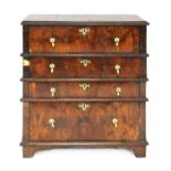 An oak and walnut transitional chest,
