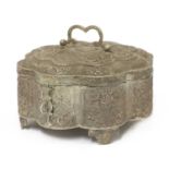 An Indian white metal betel or spice box,