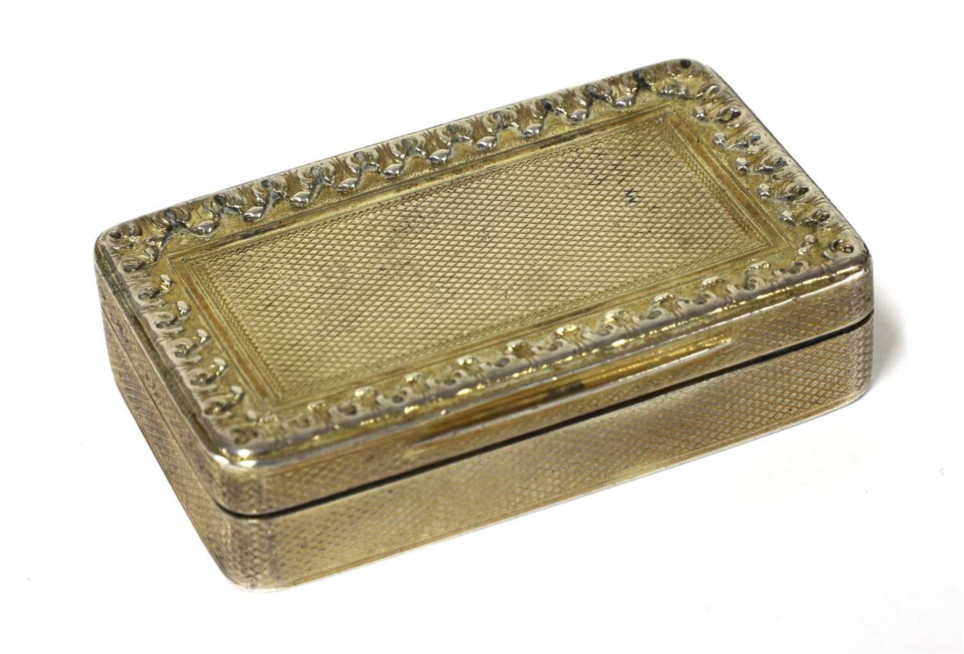 A George III silver gilt snuff box,