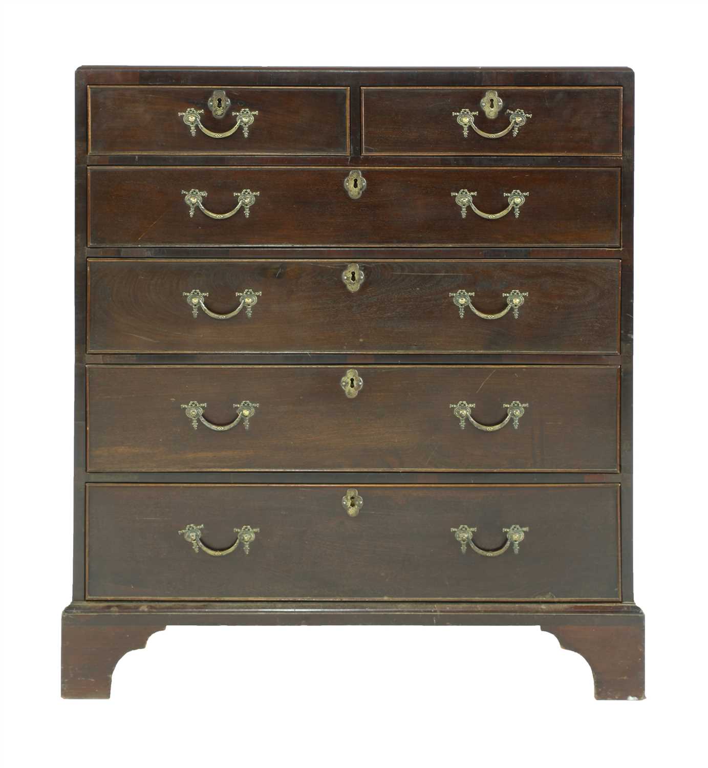 A George III walnut caddy top chest of four graduated long drawers,