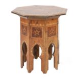 An Eastern burrwood veneered octagonal table,