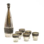 A Russian silver and enamelled vodka decanter set,