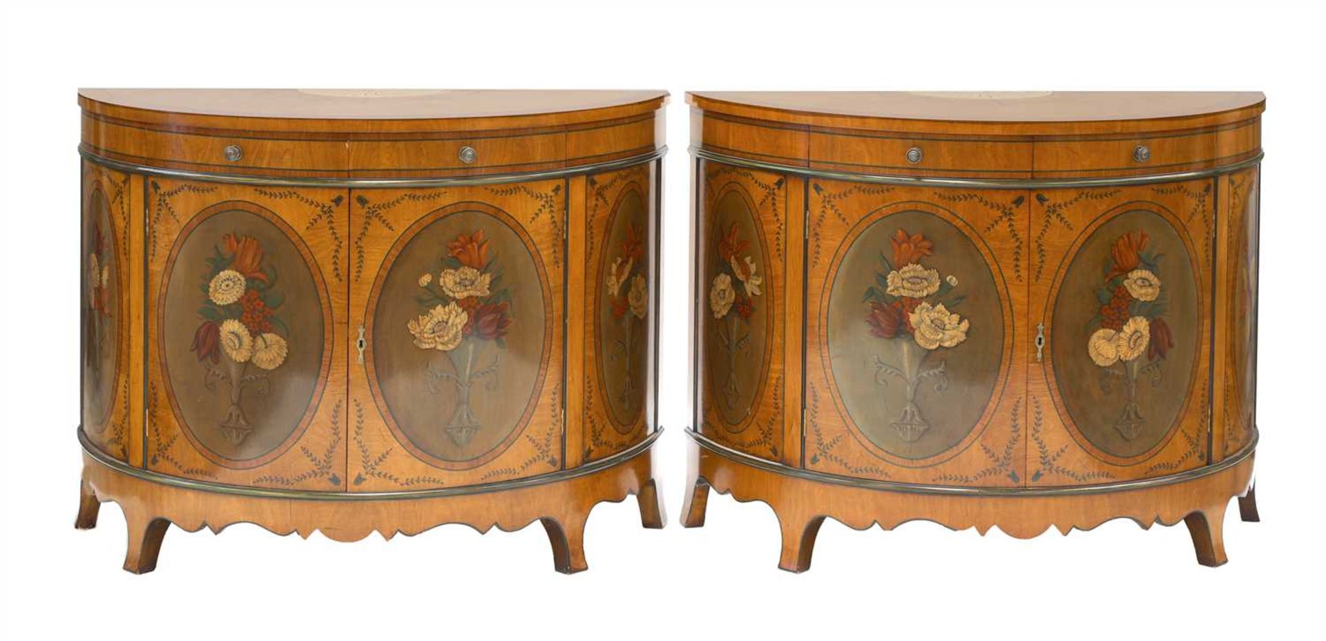A pair of George III-style demilune cabinets,