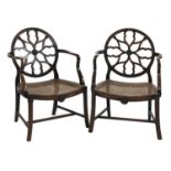 A pair of 18th century style mahogany armchairs,