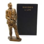 A bronze standing figure of Cecil Rhodes, and a biography