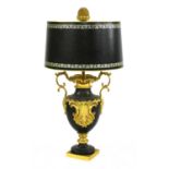 A gilt and black metal table lamp,