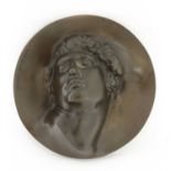 A bronze head of a youth,
