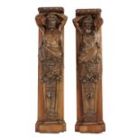 Two carved walnut figural pilaster brackets,