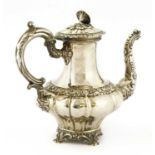 A Continental white metal coffee pot,