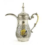 An Islamic white metal dallah coffee pot,