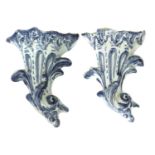 A pair of blue and white delft ware wall pockets,