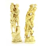 Two Japanese carved ivory groups,