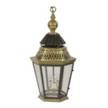 A brass, bronzed and ebonised hall lantern,