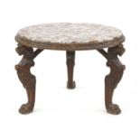 An oak circular table,