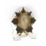 A French strut clock,