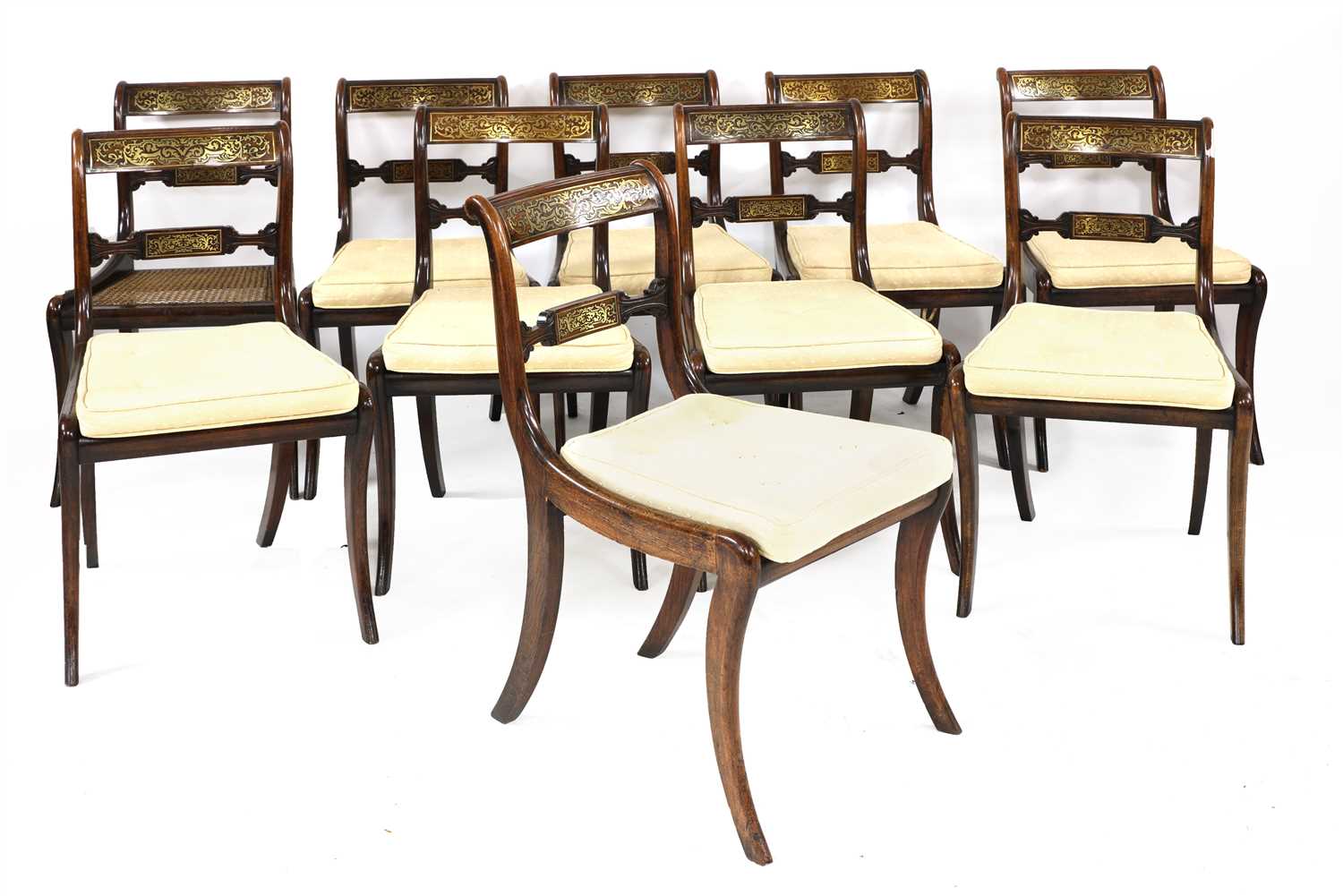 A set of ten Regency brass inlaid rosewood dining chairs,