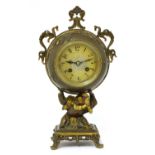 A gilt bronze drum eight-day mantel clock,