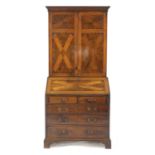 A George III mahogany and yew bureau bookcase,