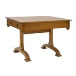 A golden oak library table,