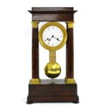 A mahogany French Empire portico clock,