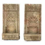 A pair of sandstone wall sconces,