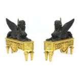 A pair of bronze chenets,