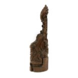 A profusely carved oak pew end,
