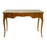 A French Louis XV-style mahogany and gilt metal-mounted writing table,